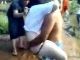 Guy Fuck Classmate In Front Of the Crowd By The River Mobile Phone Video